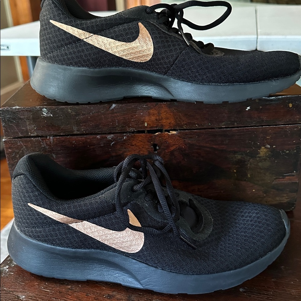 Nike Women's Black Sneakers with Gold Swoosh